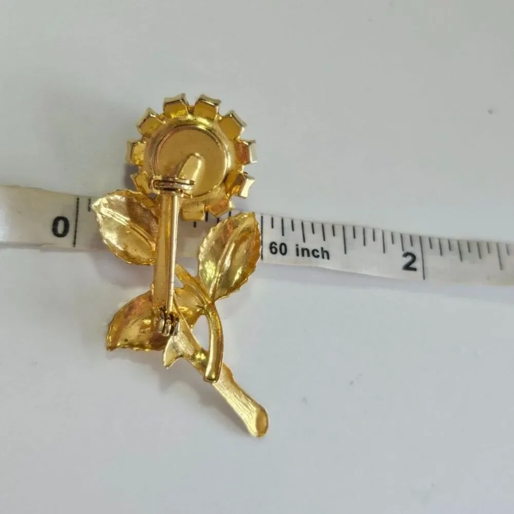 Vintage gold tone rhinestone flower brooch